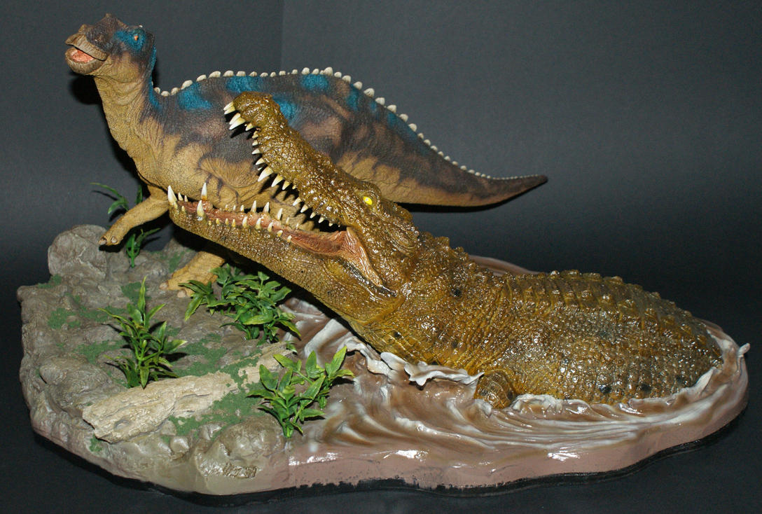http://pre13.deviantart.net/94a6/th/pre/f/2014/158/1/5/kritosaurus_vs__deinosuchus_by_sajomi-d7lgi4u.jpg